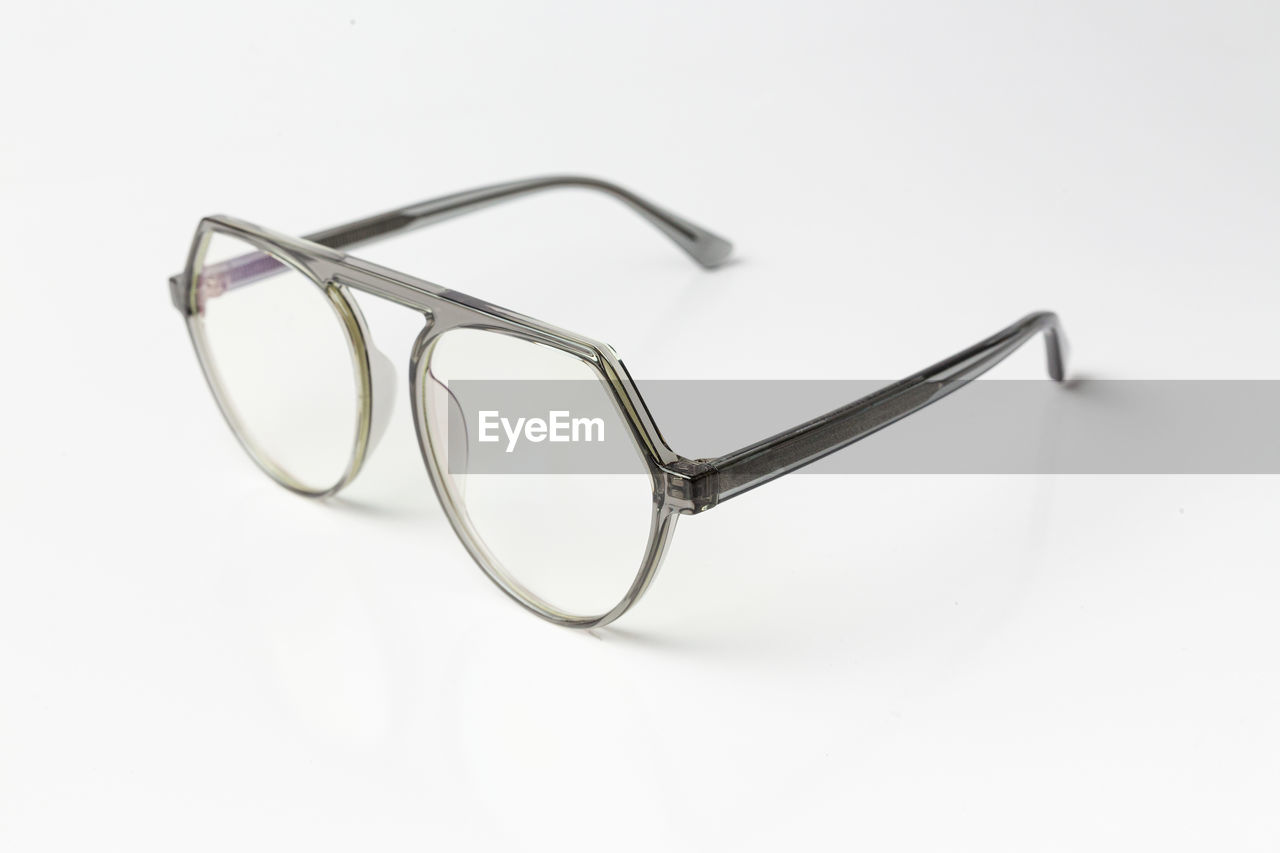 eyewear, vision care, glasses, eyeglasses, cut out, single object, white background, studio shot, goggles, indoors, fashion, no people, close-up, healthcare and medicine, personal accessory