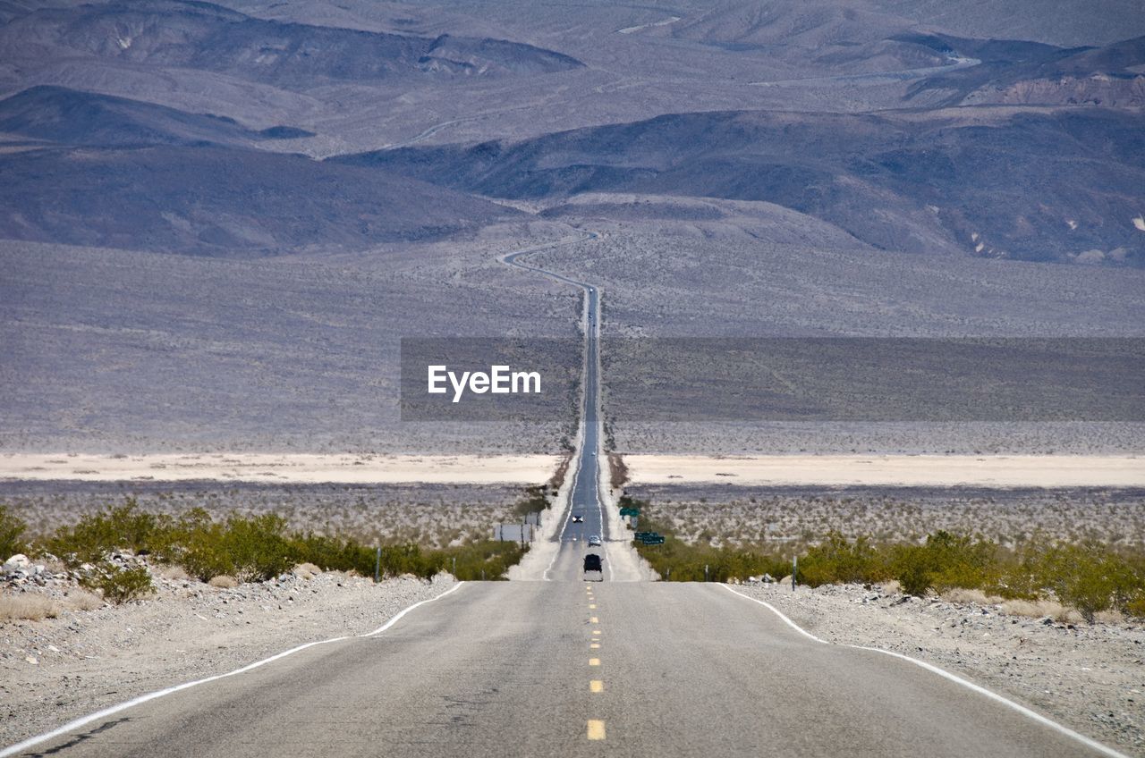 Road leading towards mountain