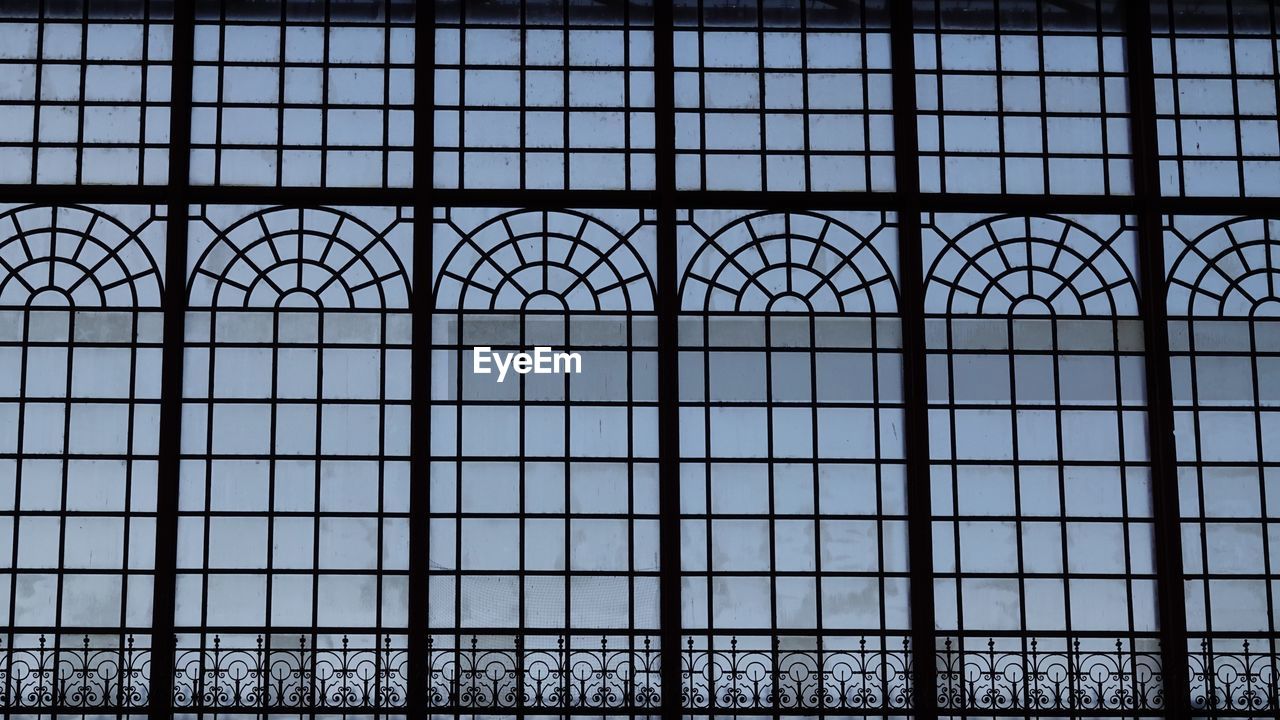 Full frame shot of metal windows in train station