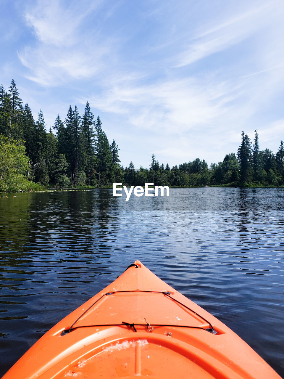 boat in lake against sky