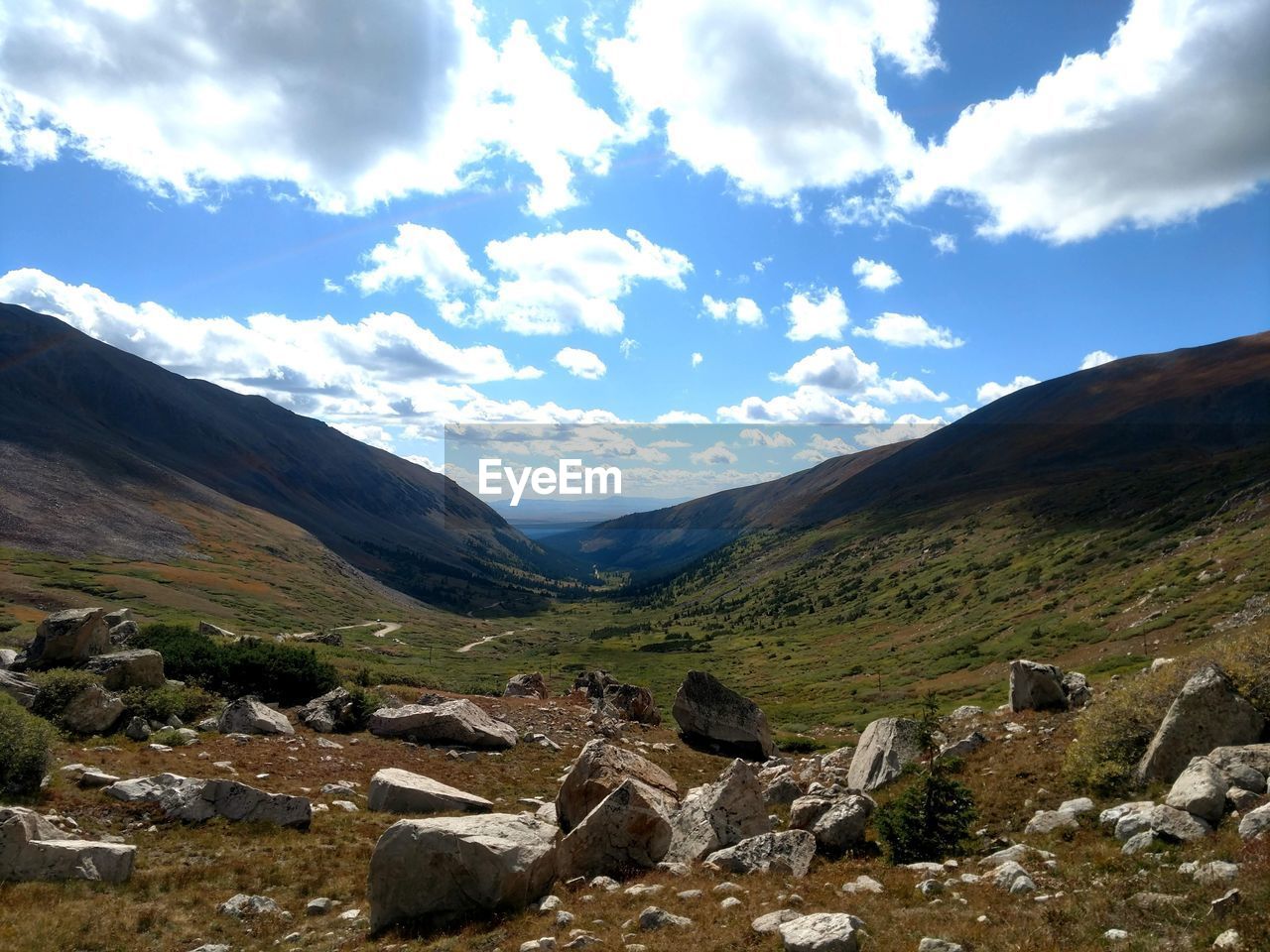 SCENIC VIEW OF ROCKY MOUNTAINS AGAINST SKY