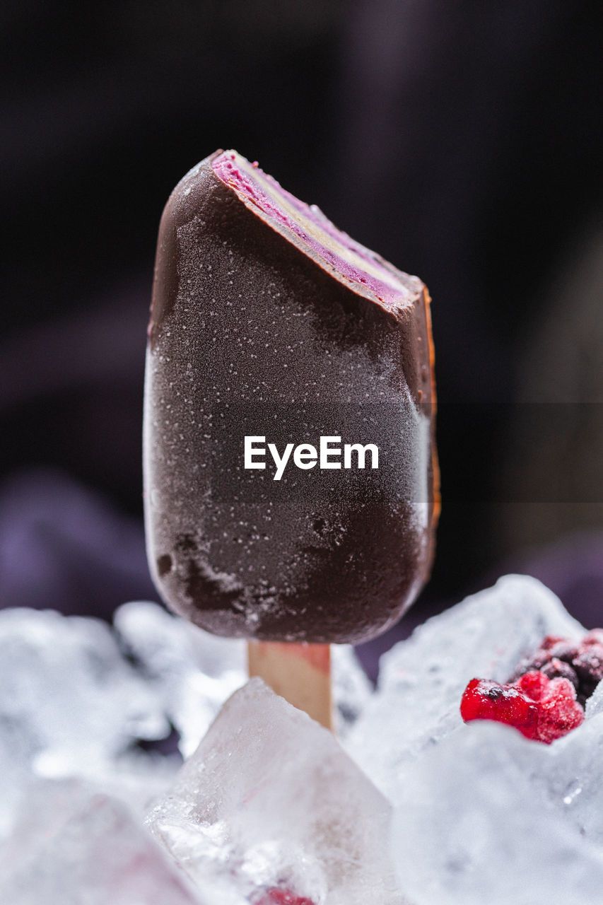 CLOSE-UP OF ICE CREAM CONE IN GLASS