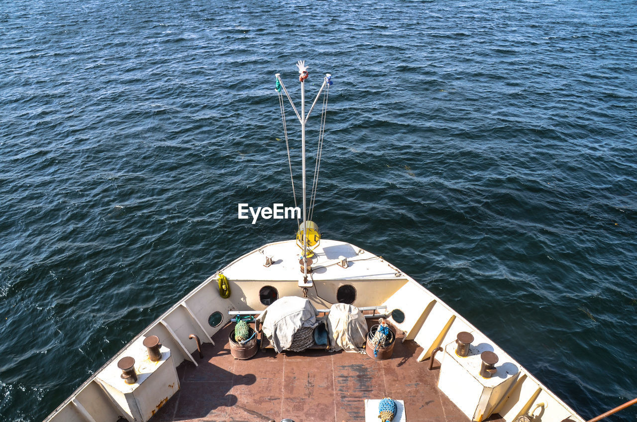 High angle view of people in boat on sea