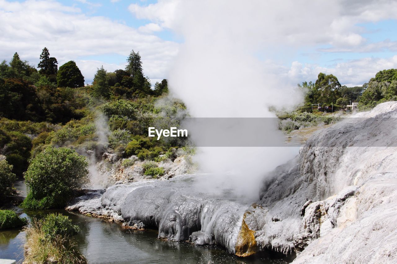 View of hot spring against sky