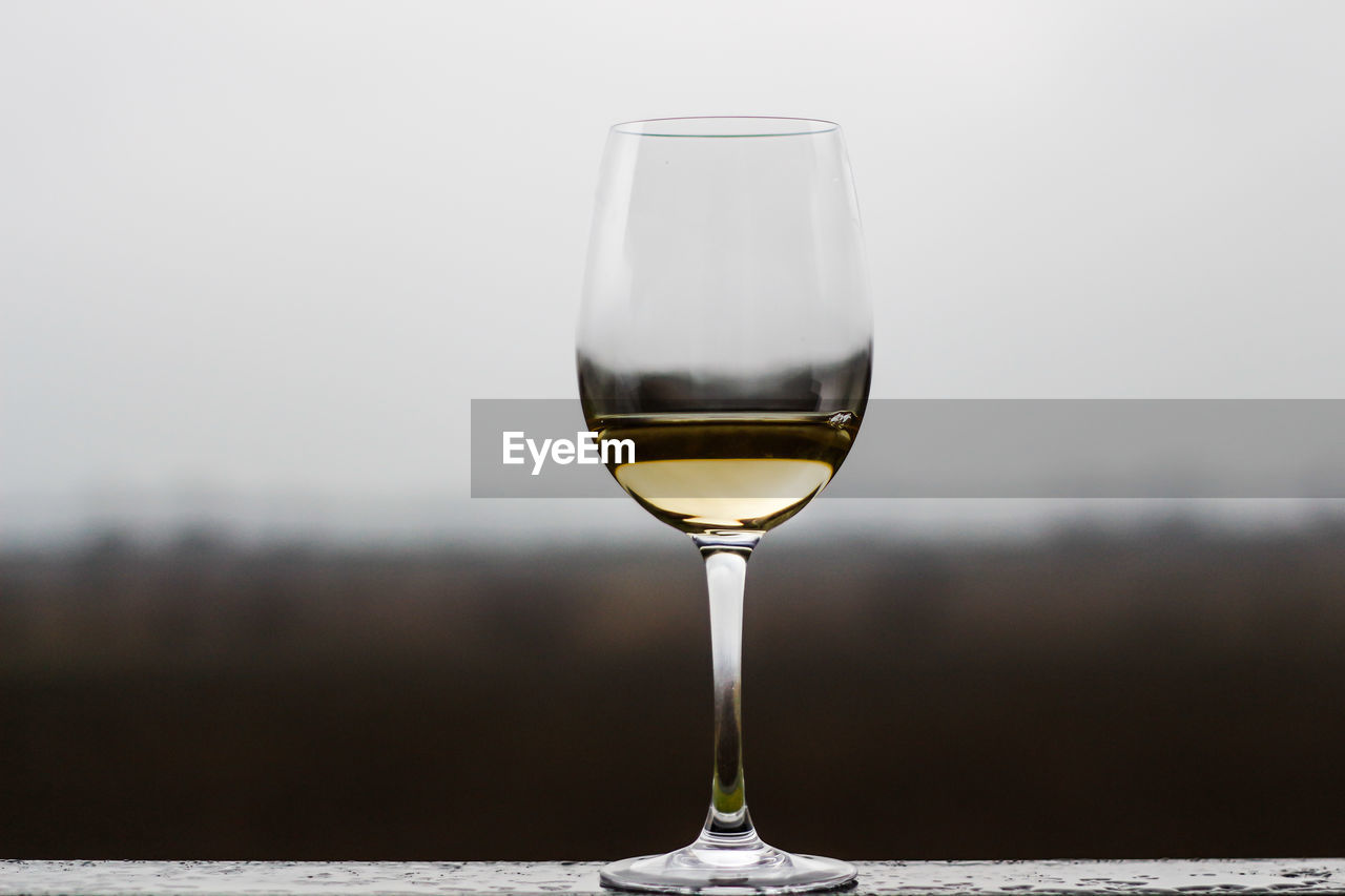 Close-up of wine in wineglass