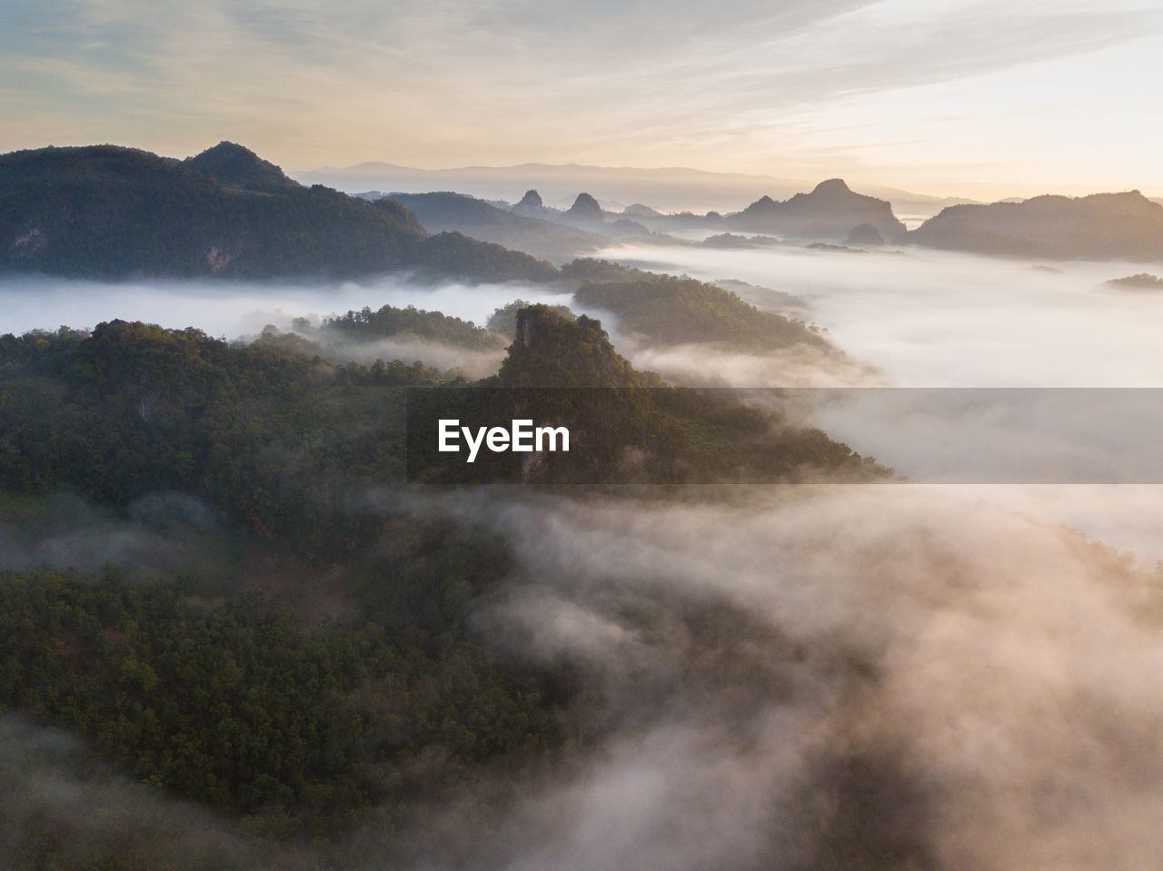 Scenic view of mountains against sky during sunset