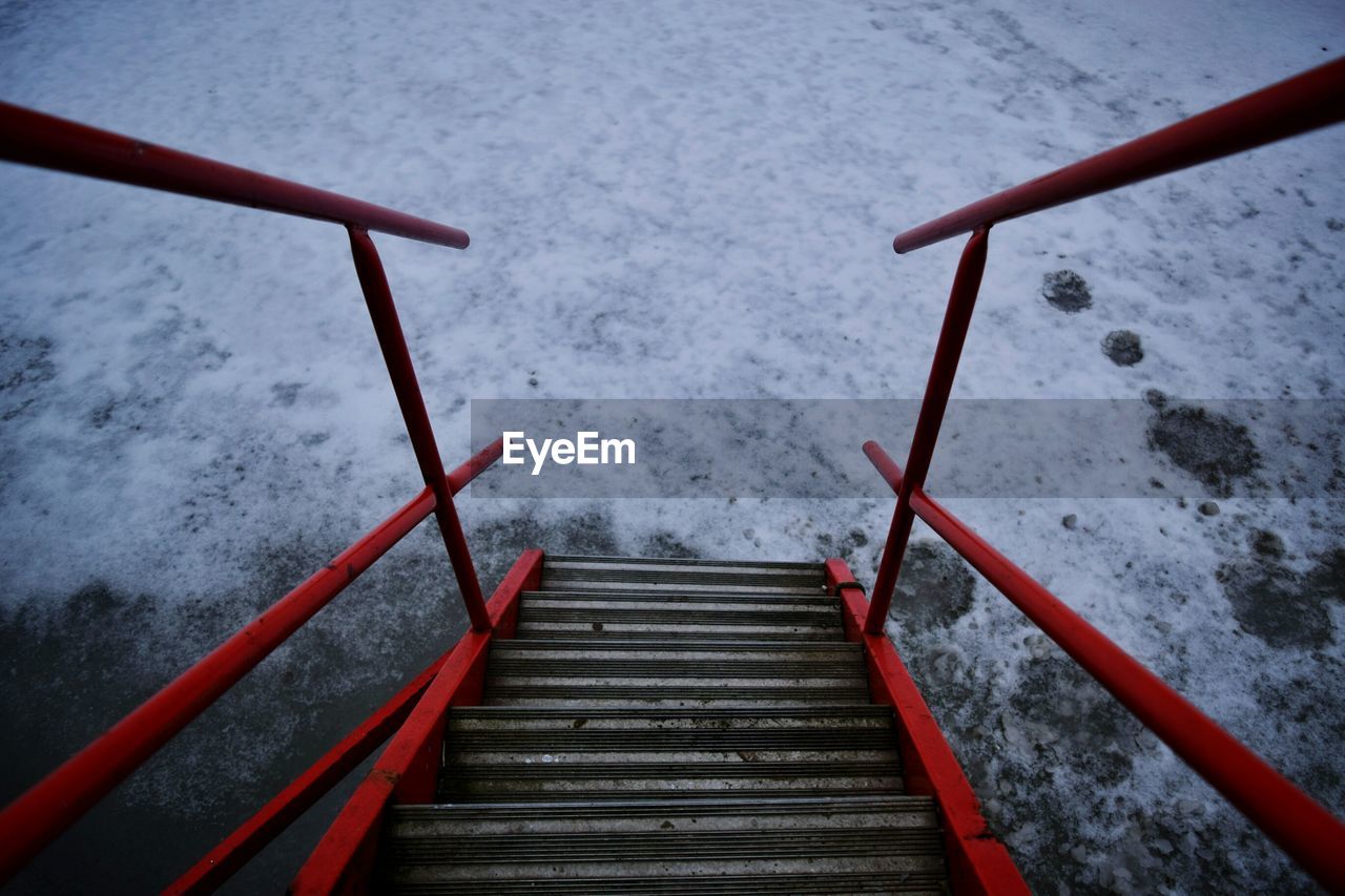 High angle view of stairs in snow