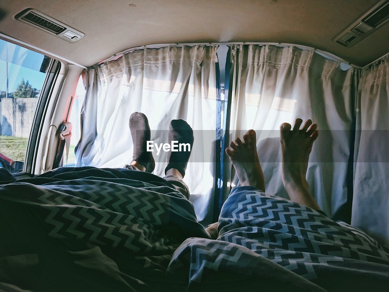 Low section of people in camper van