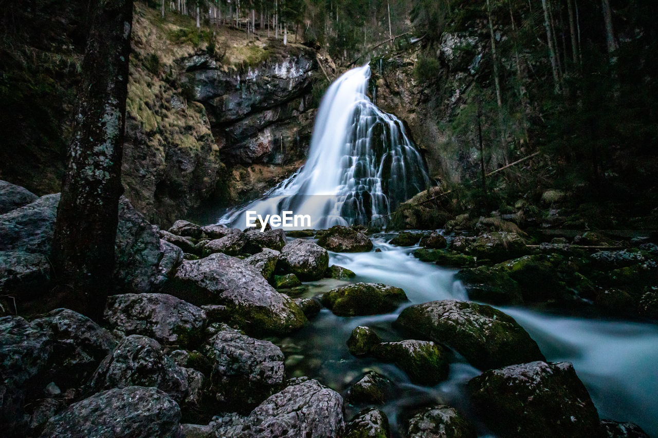 SCENIC VIEW OF WATERFALL