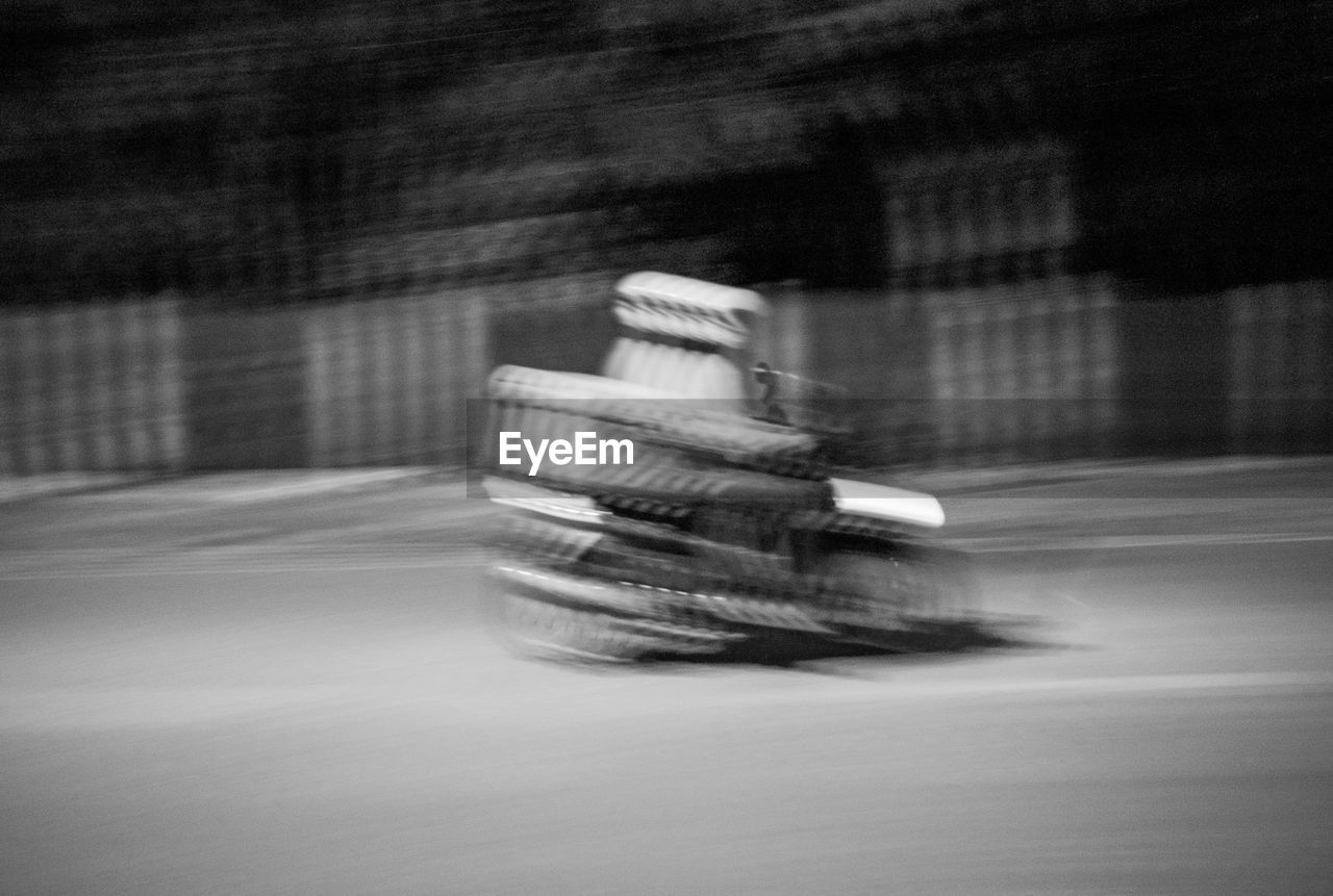 Slow shutter speed with motorcycle on street 