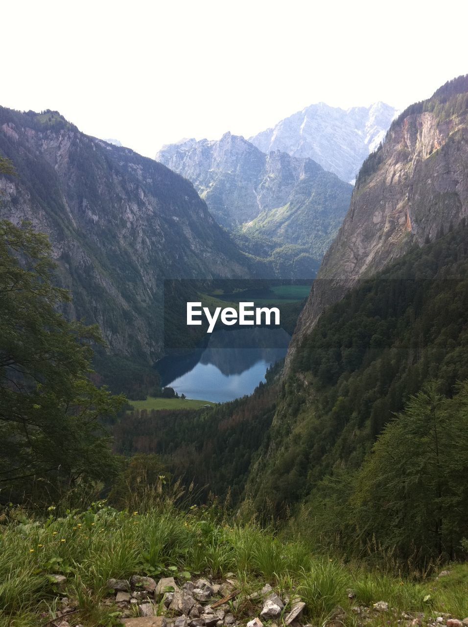 SCENIC VIEW OF LAKE AND MOUNTAINS