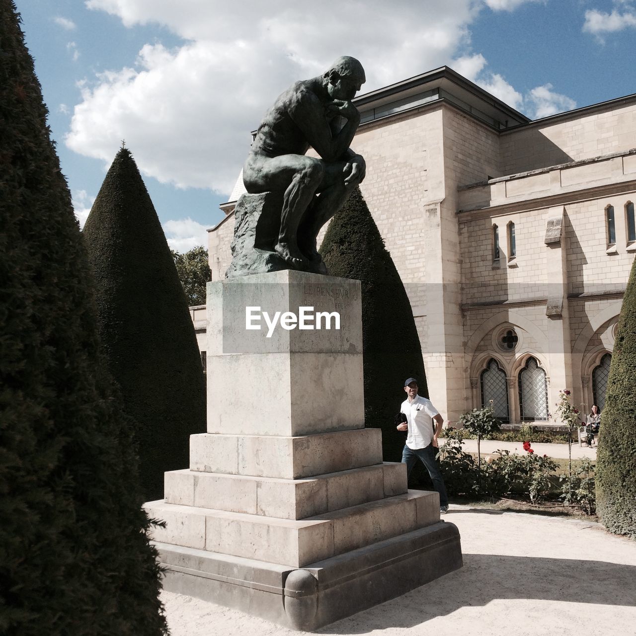 STATUE AGAINST HISTORIC BUILDING