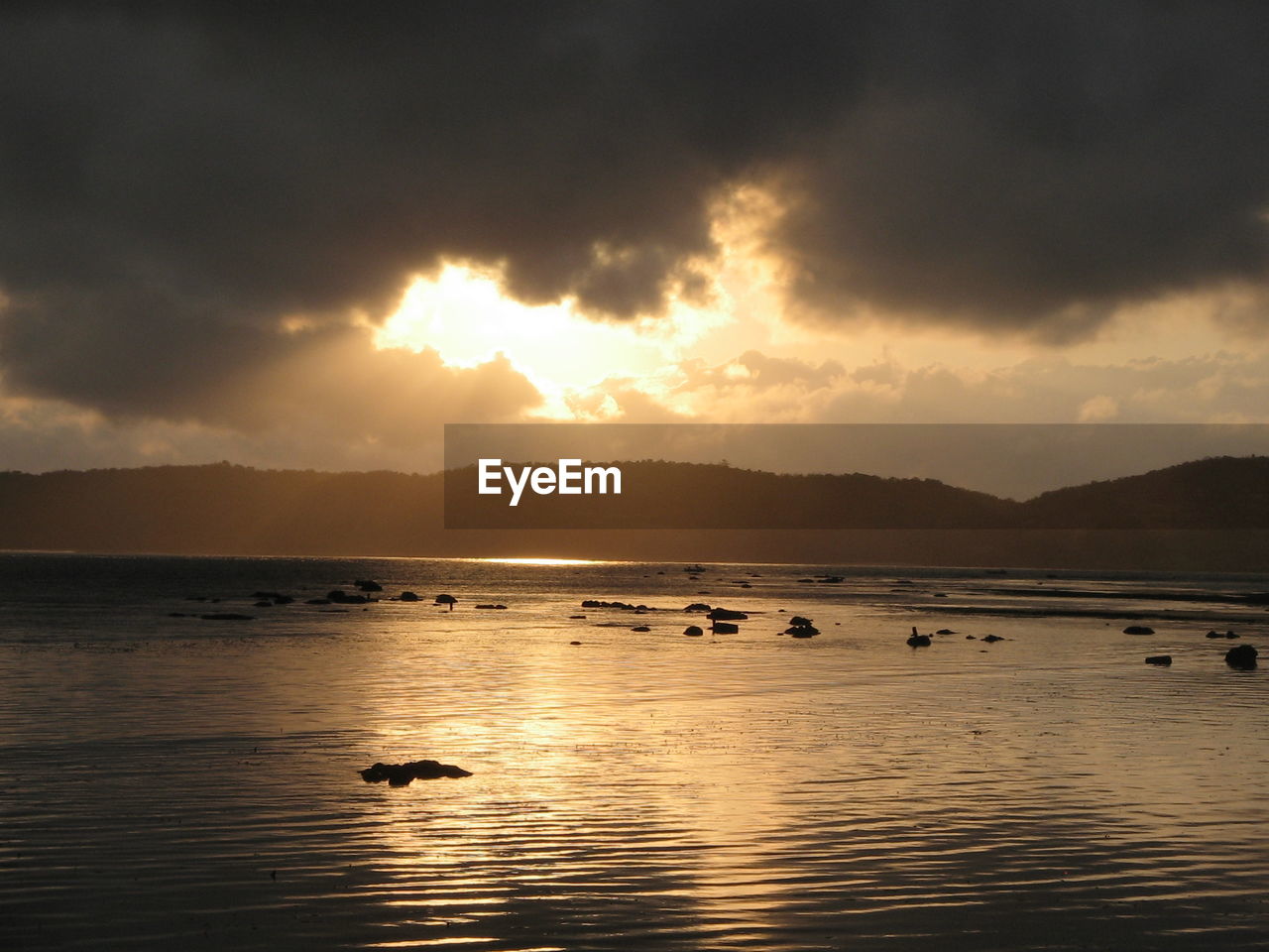 SCENIC VIEW OF SEA DURING SUNSET