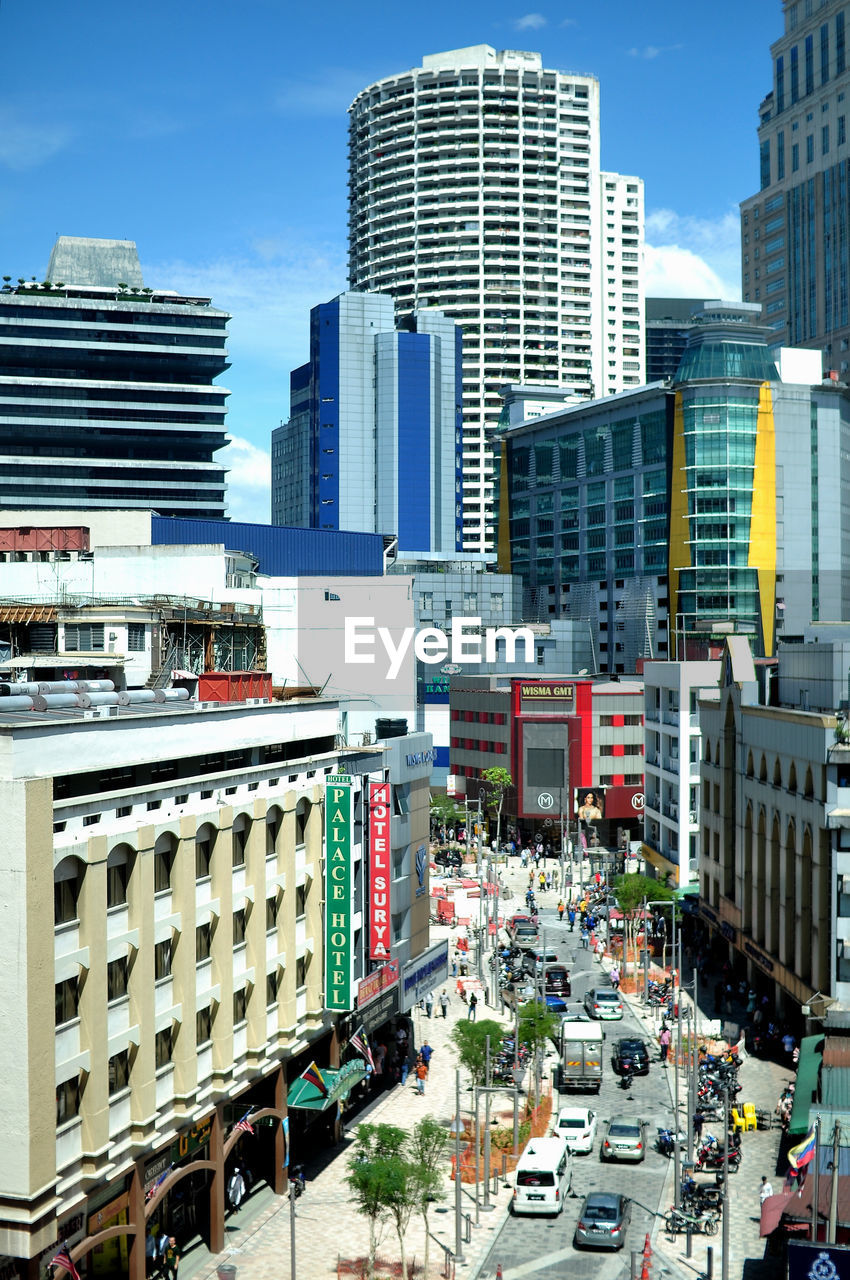 View of  jalan masjid india  street and buildings against sky