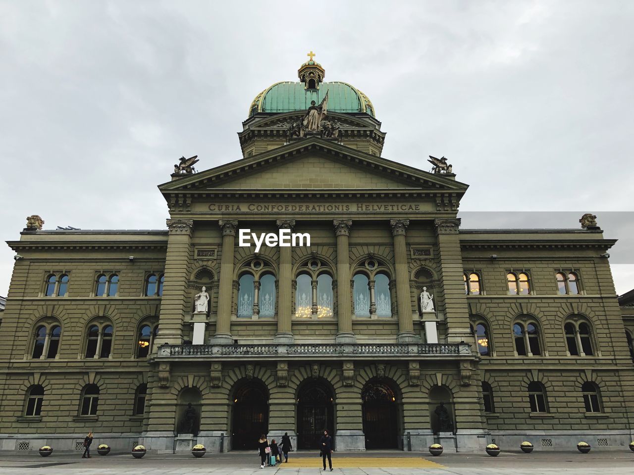 Low angle view of historical building in city against sky