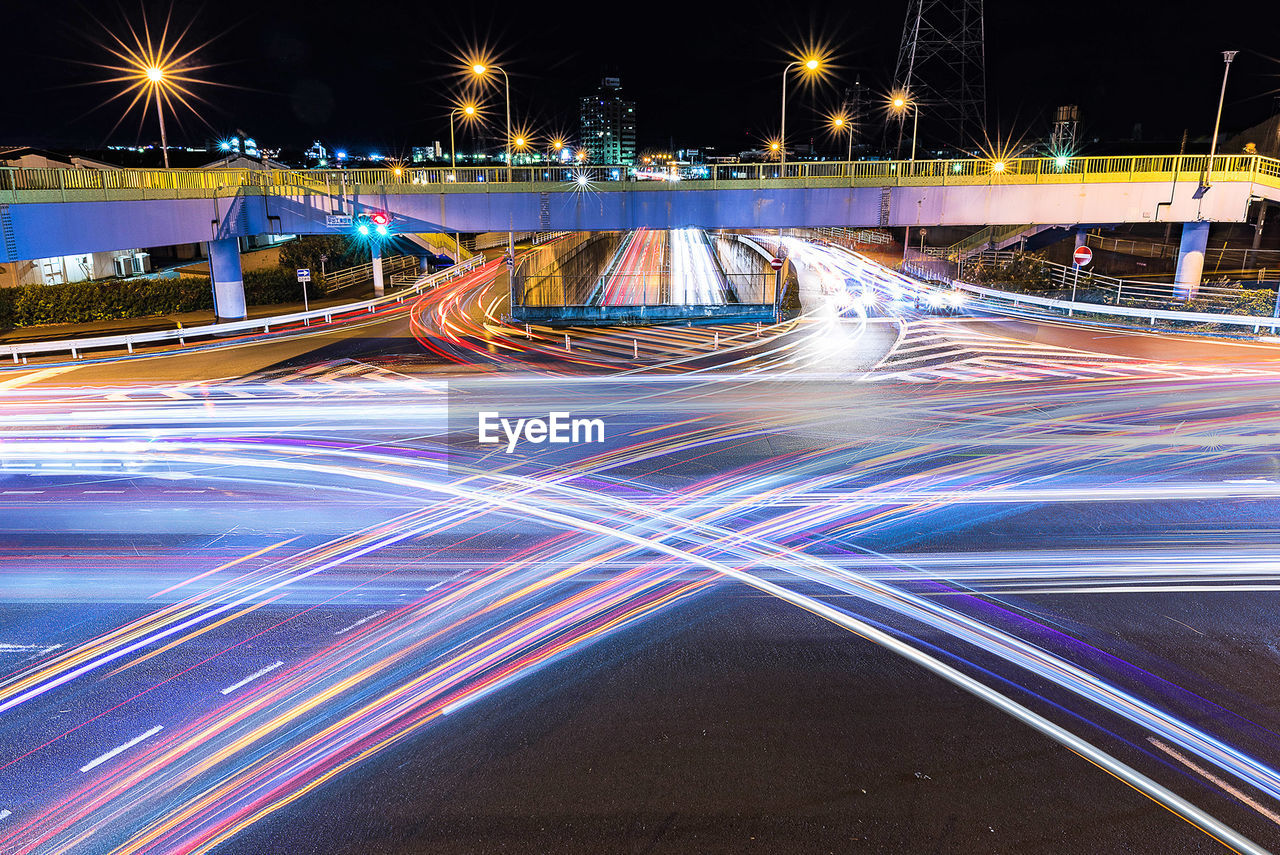 High angle view of light trails on city street