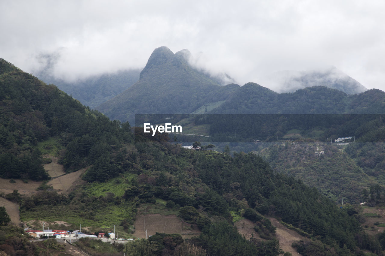 Scenic view of mountains against cloudy sky at ulleungdo island