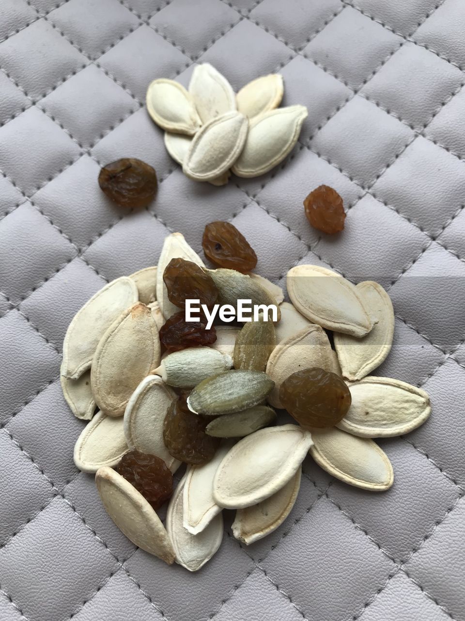 HIGH ANGLE VIEW OF EGGS IN CONTAINER ON TABLE