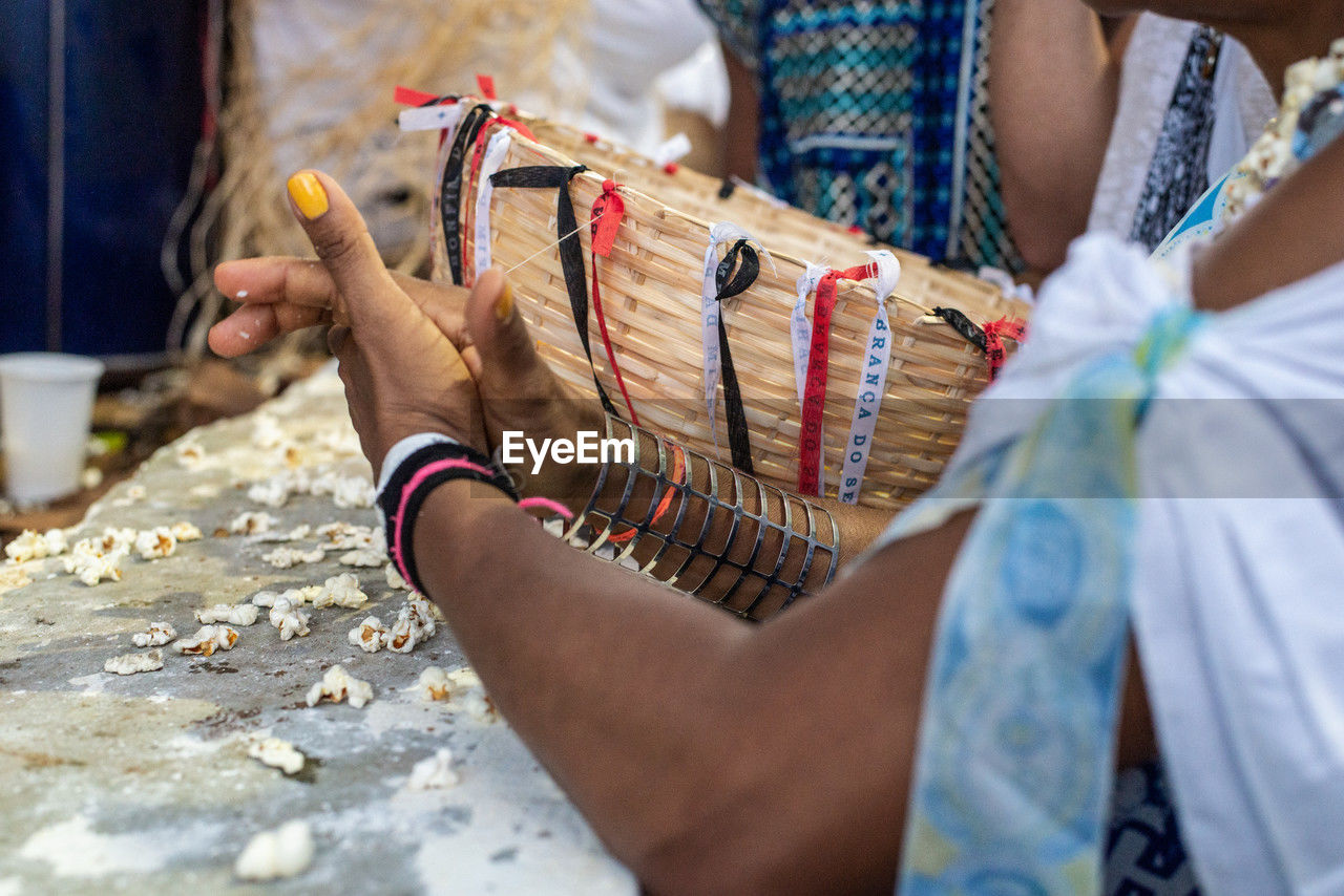 adult, spring, midsection, women, day, selective focus, one person, holding, leisure activity, arts culture and entertainment, hand, traditional clothing, outdoors, tradition, lifestyles, clothing, close-up