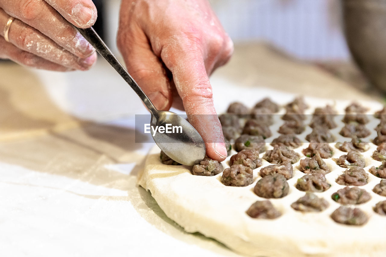 Pelmeni dumplings making ravioli cooking at home