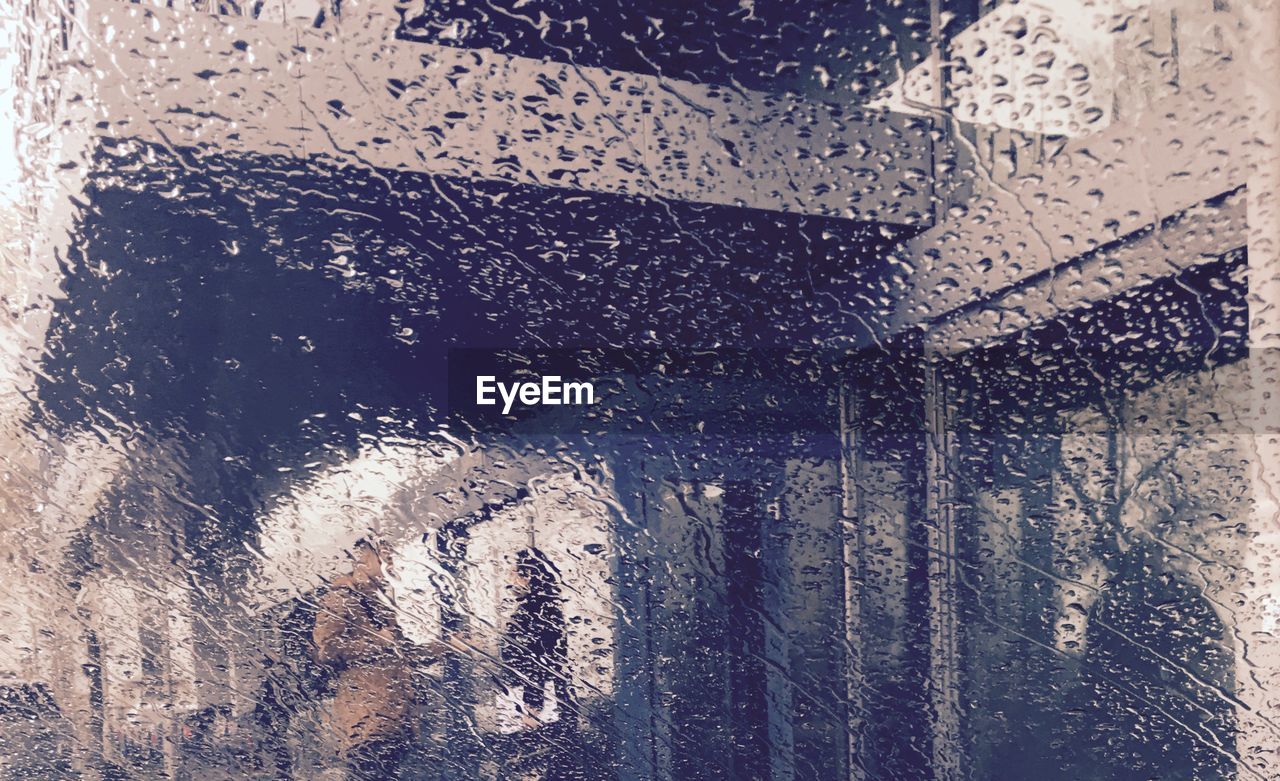 Close-up of water drops on glass window