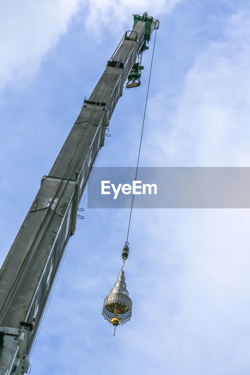 LOW ANGLE VIEW OF TRADITIONAL WINDMILL AGAINST SKY