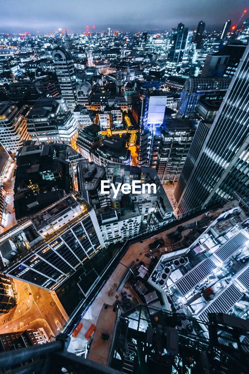 Aerial view of illuminated cityscape at night