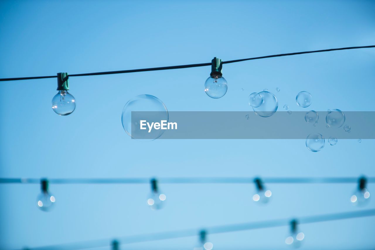 LOW ANGLE VIEW OF BUBBLES IN WATER