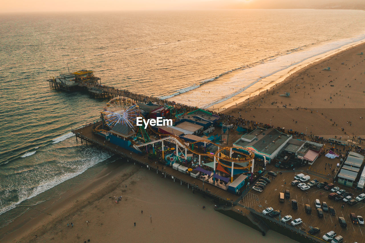 Aerial view of ferris wheel at beach