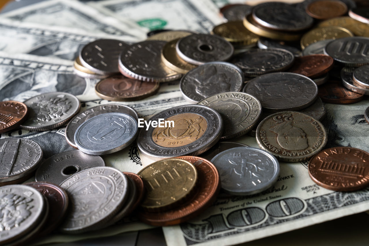 money, finance, currency, coin, wealth, business, money handling, cash, close-up, savings, large group of objects, abundance, metal, no people, business finance and industry, indoors, backgrounds, finance and economy, still life, heap, paper currency, silver, variation, investment