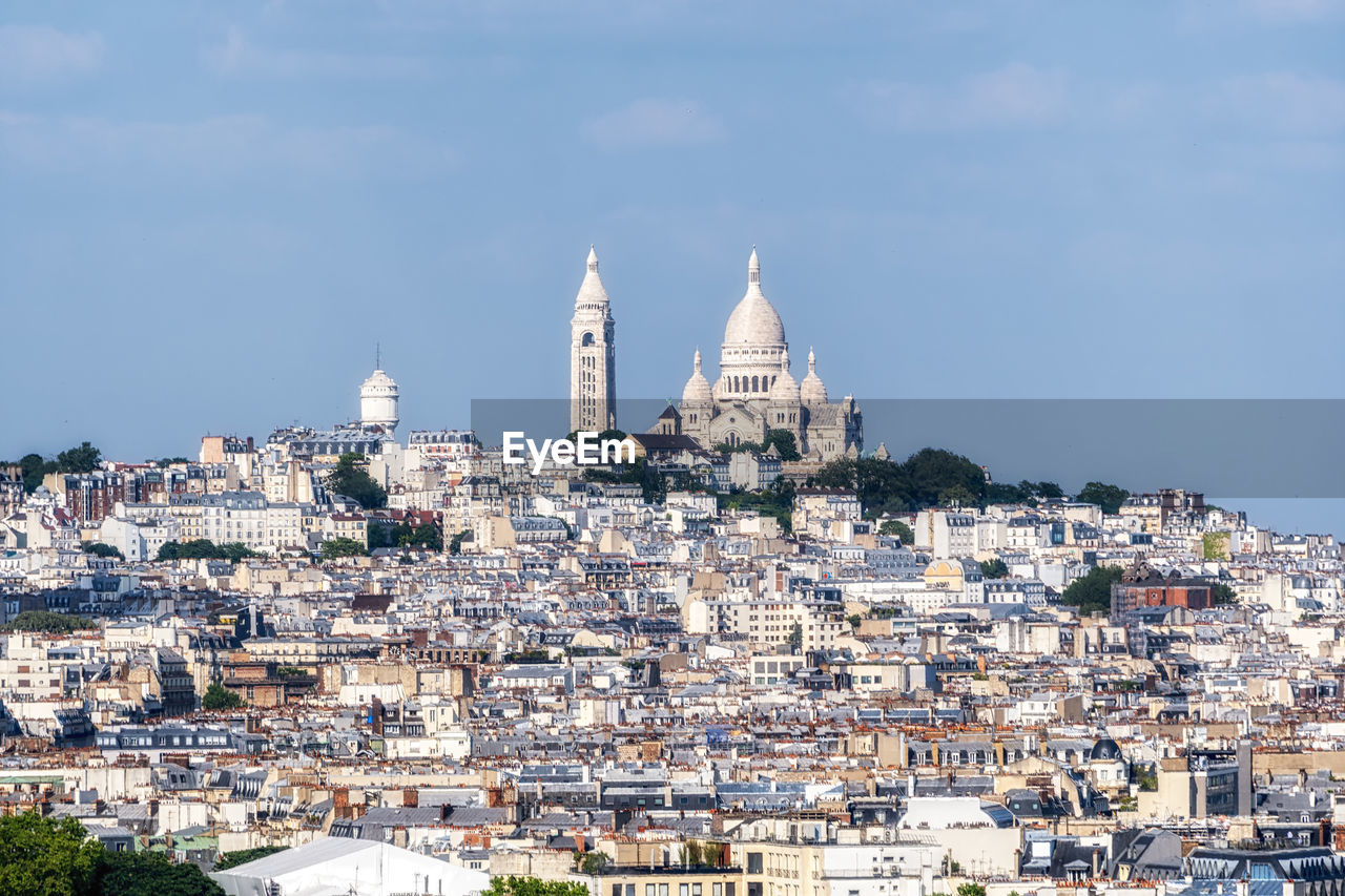 Sacre coeur viewed from top of arc de triomphe. famous landmark view with montmartre neighborhood 