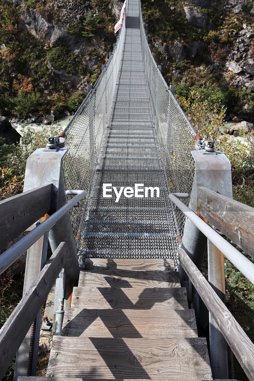 Vetical photo of a long suspension bridge