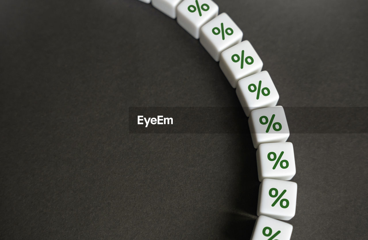 A chain of interest and loans. discounts and sale promotions. loyalty program. debt burden.