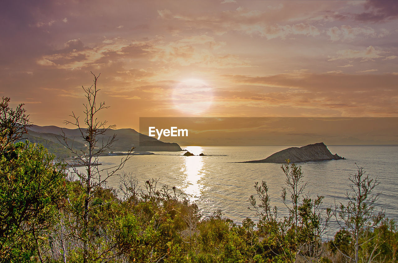 SCENIC VIEW OF SEA DURING SUNSET