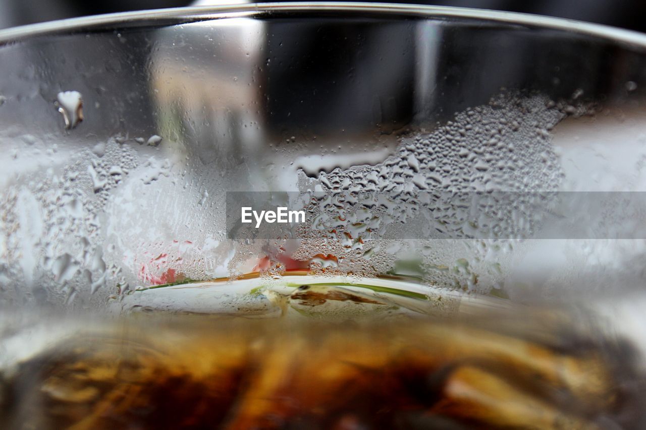 Close-up of condensation on drinking glass