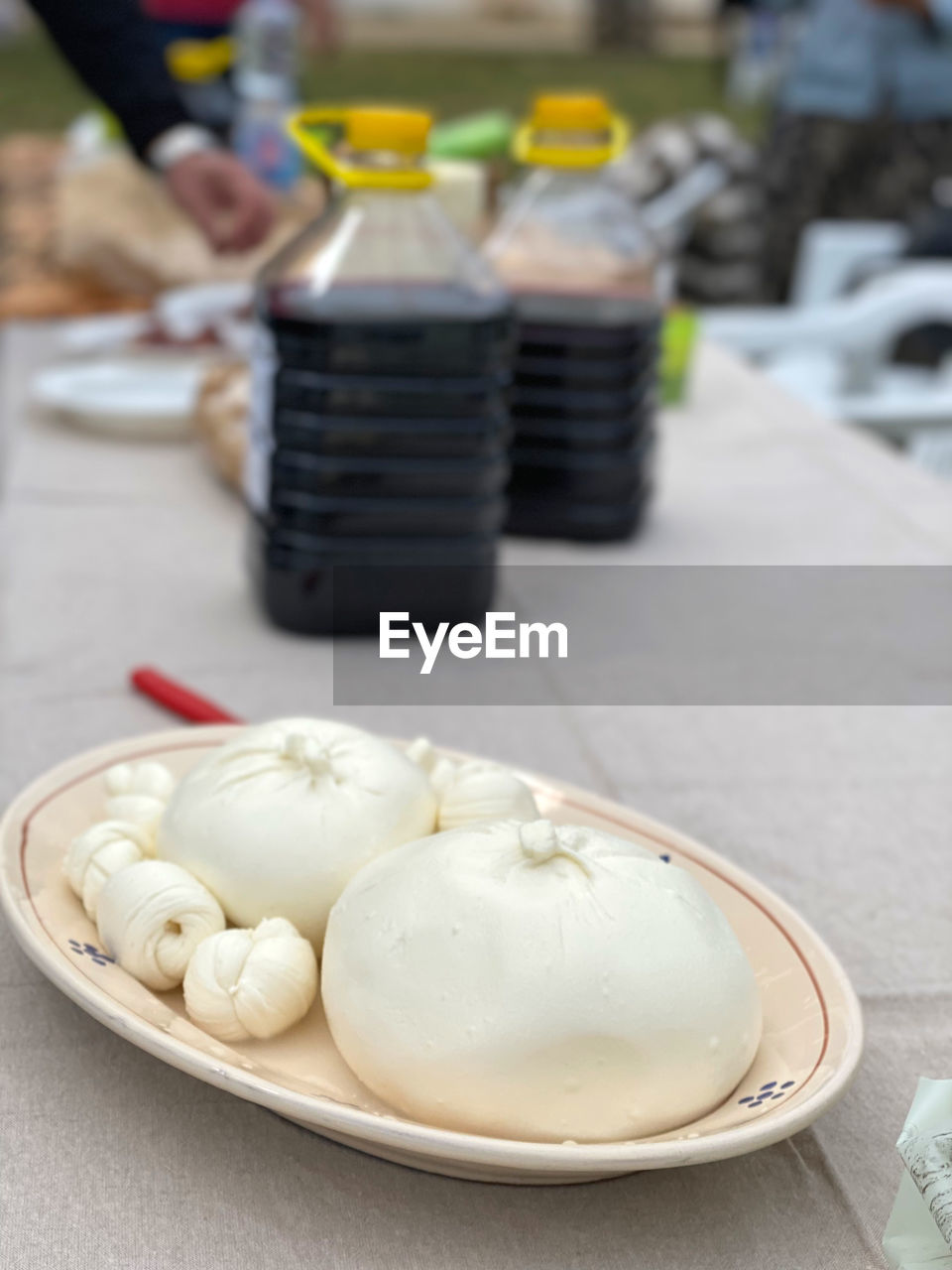 food, food and drink, dish, freshness, focus on foreground, baked, dumpling, meal, asian food, healthy eating, dessert, cuisine, chinese food, breakfast, sweet food, table, close-up, business, buuz, xiaolongbao, wellbeing