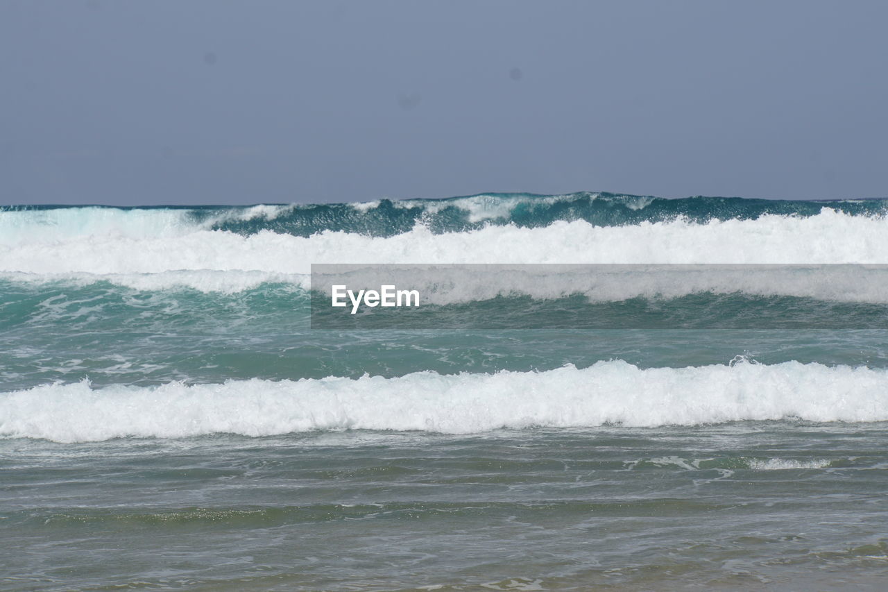 Scenic view of sea against clear sky