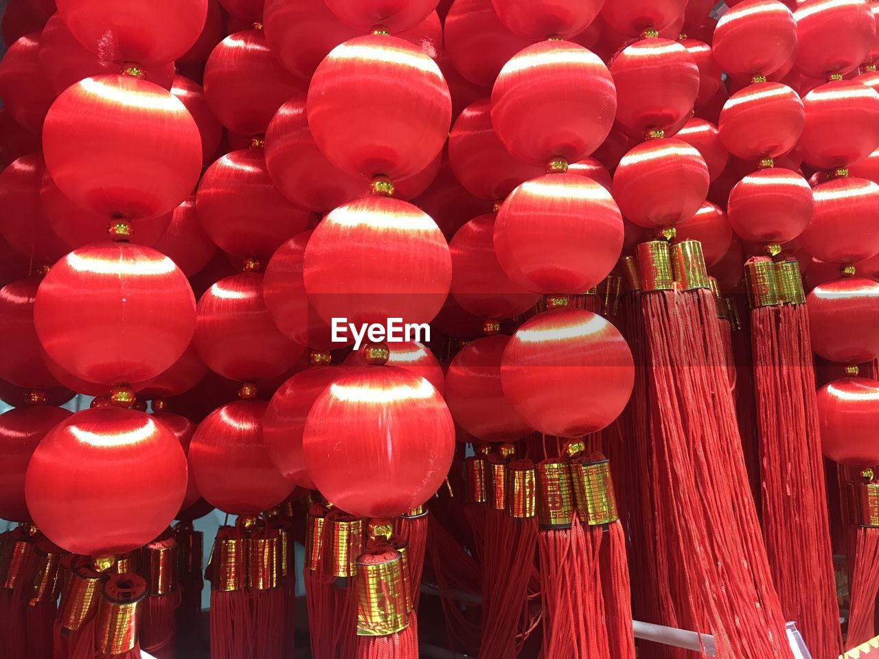 FULL FRAME SHOT OF RED LANTERNS HANGING IN MARKET