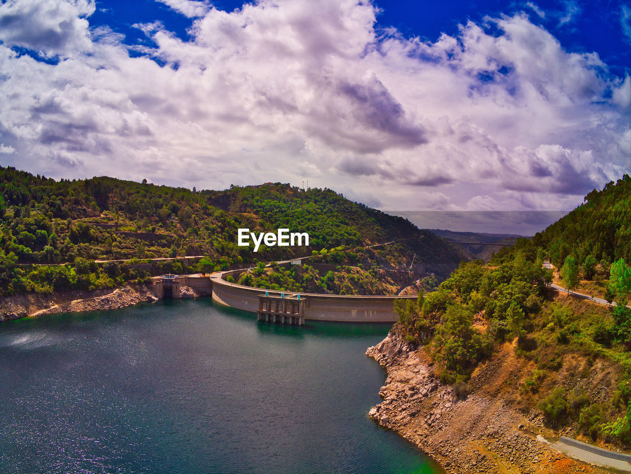 High angle view of river amidst plants against sky