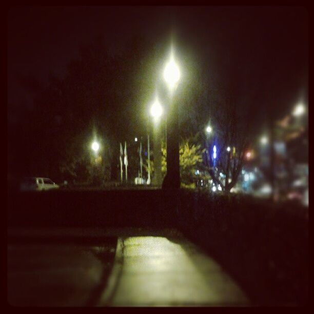 STREET LIGHT ON ROAD AT NIGHT