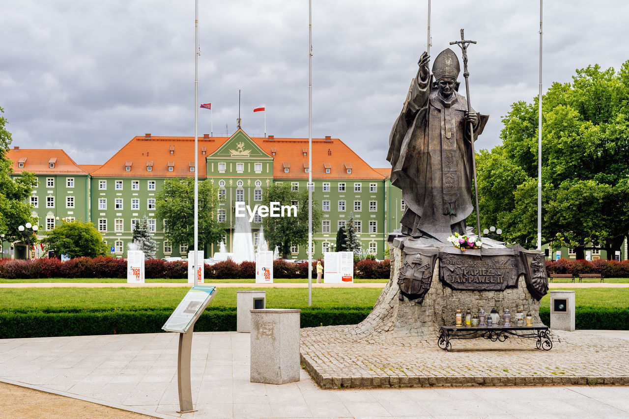 STATUE AGAINST SKY