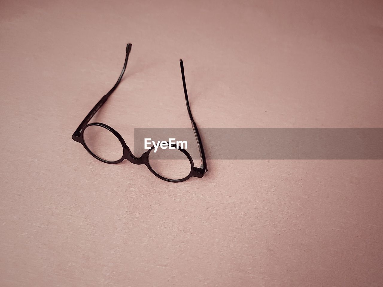 Close-up of eyeglasses on table