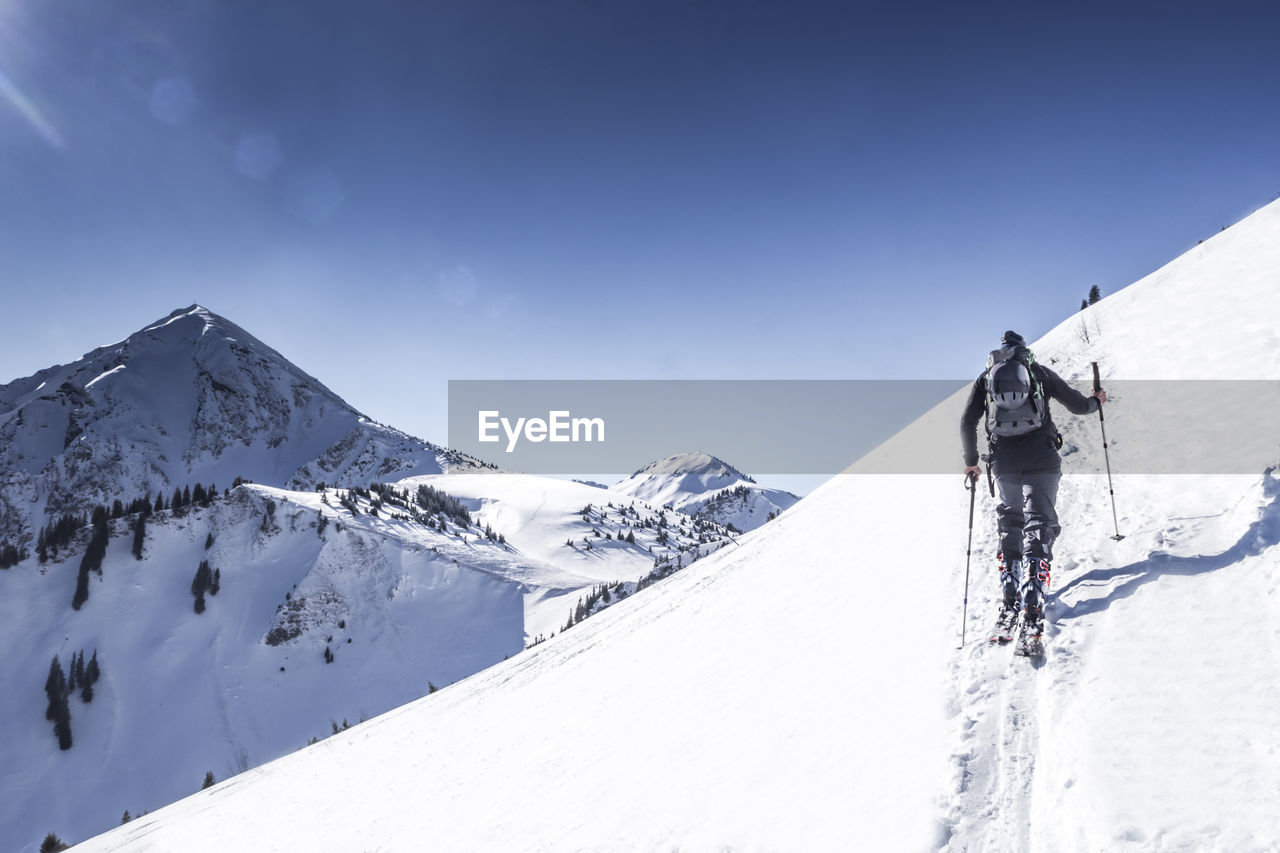 SNOWCAPPED MOUNTAIN AGAINST CLEAR SKY
