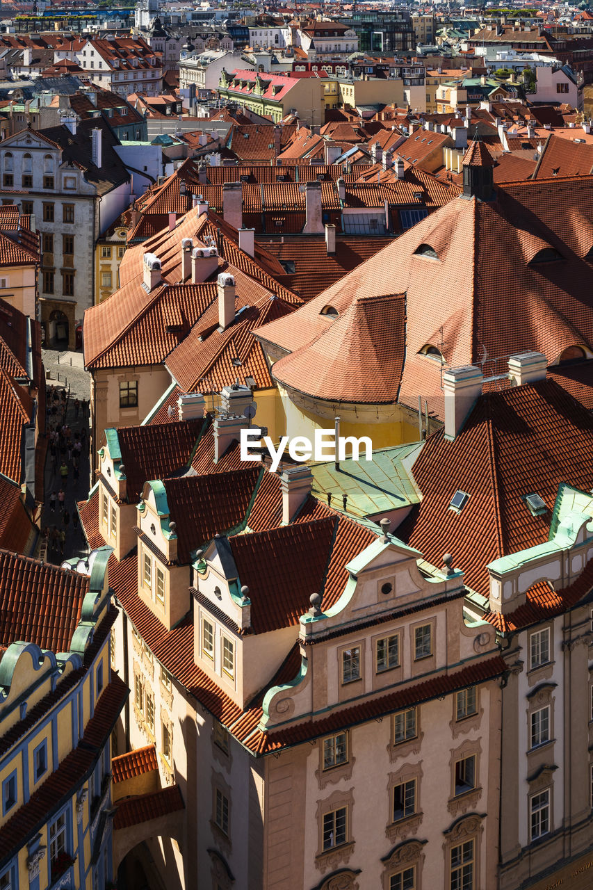Vew from the top of city hall to prague old town, view on roofs from above on summer sunny day