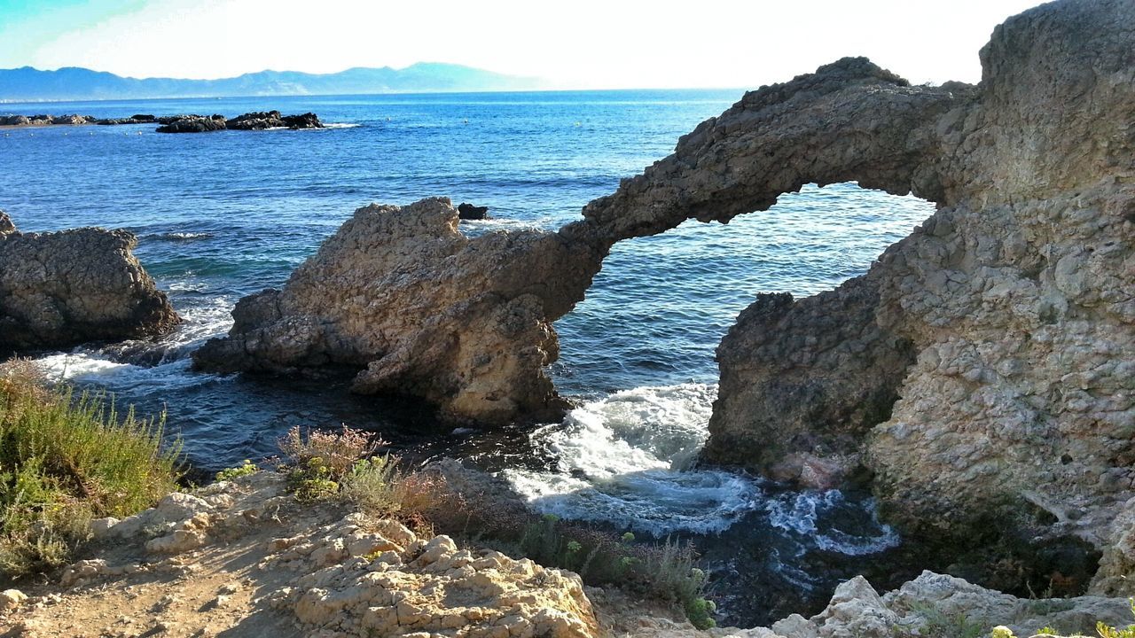 Scenic rock formation by sea