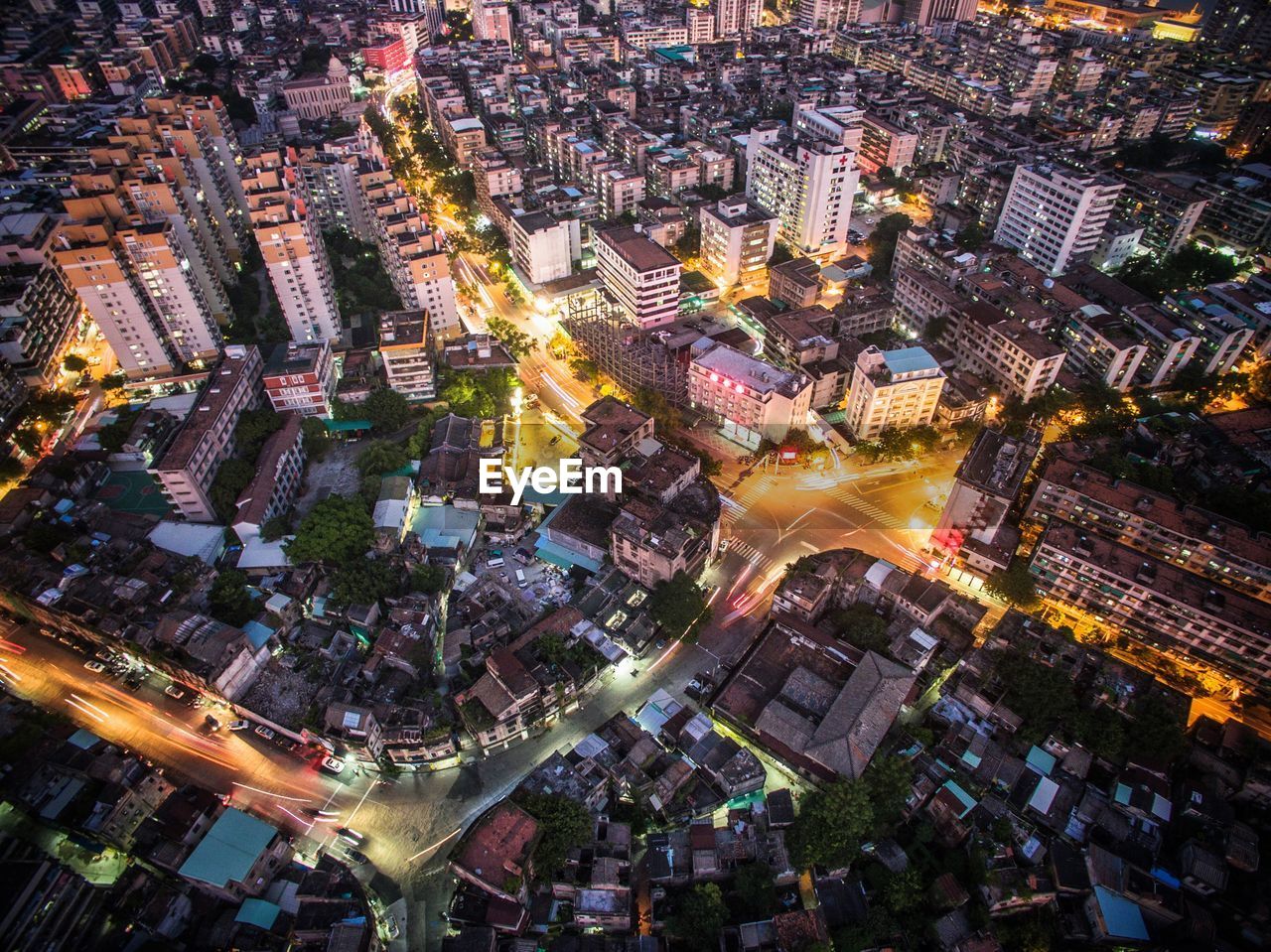 High angle view of illuminated cityscape at night