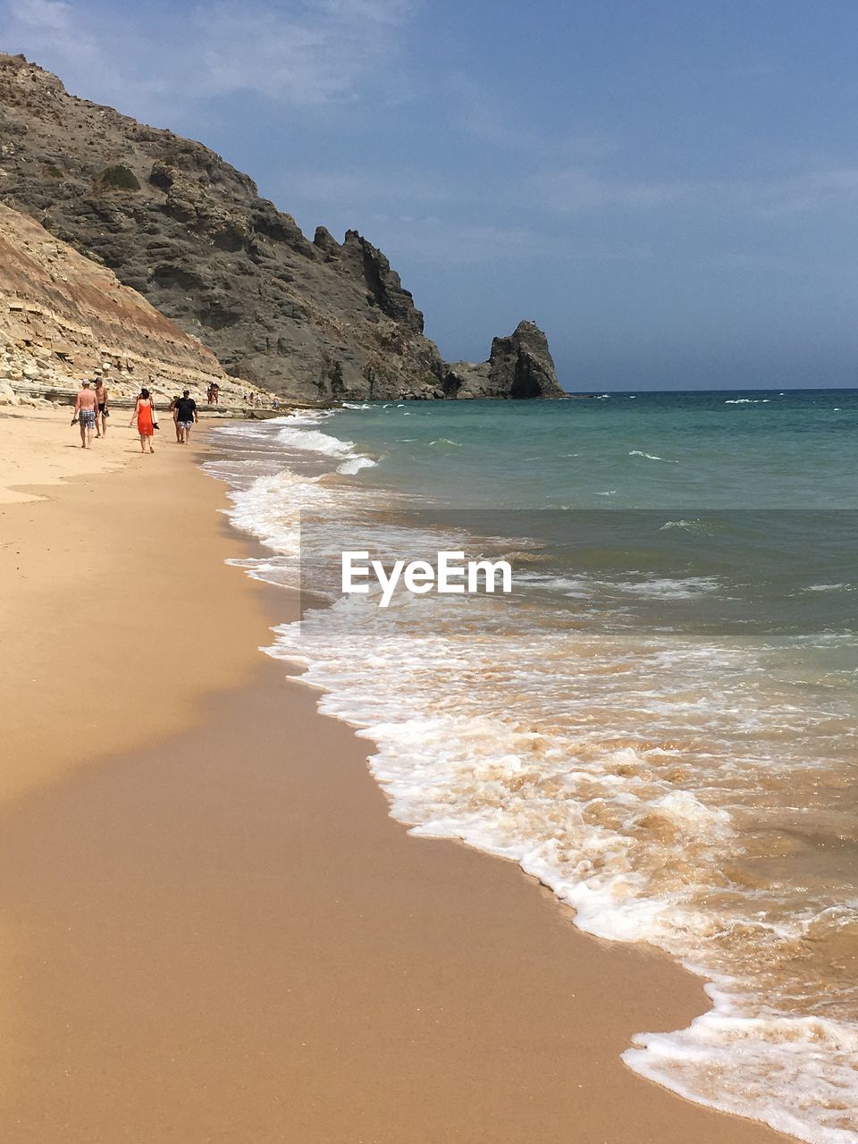 TOURISTS ON BEACH