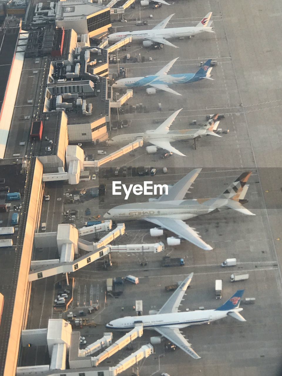 HIGH ANGLE VIEW OF AIRPLANE IN AIRPORT