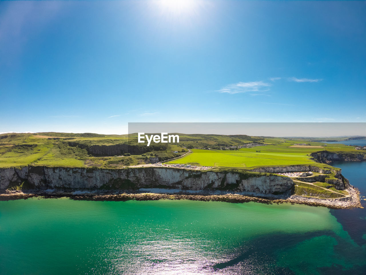 SCENIC VIEW OF SEA AGAINST BLUE SKY