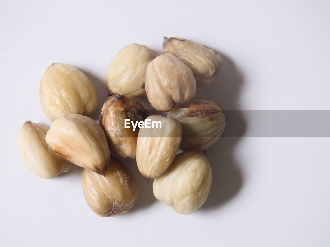 food and drink, food, wellbeing, healthy eating, plant, freshness, nuts & seeds, produce, indoors, studio shot, nut, nut - food, still life, white background, close-up, ingredient, no people, cut out, group of objects, large group of objects, almond, group